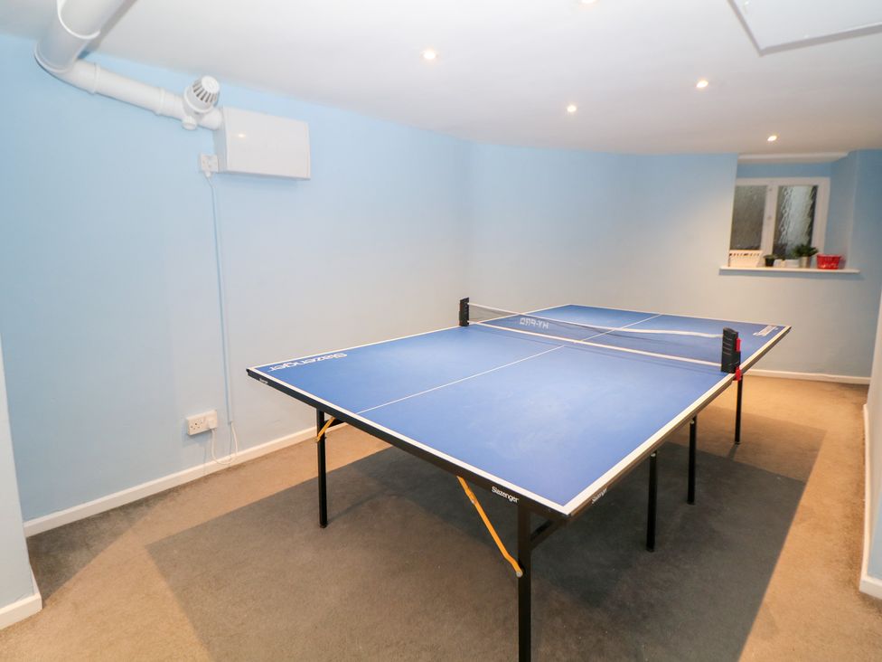 A game room with a table tennis table at Rock House Buxton