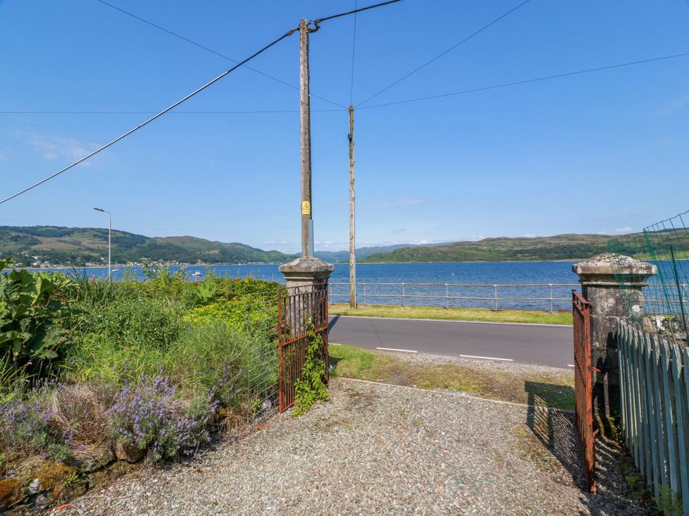 A view of the water from a gate at Altafearn in Tighnabruaich