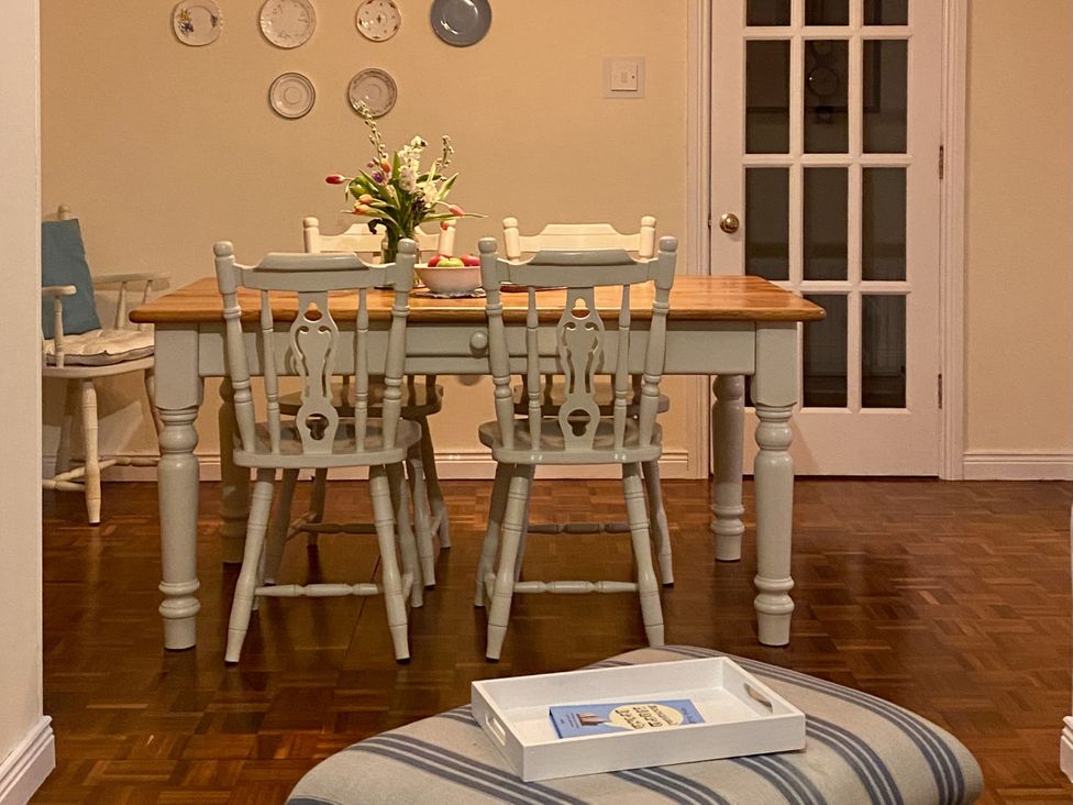 A dining room with a table and chairs at Betty's Farm Cottage, Lack near Ederney, County Fermanagh