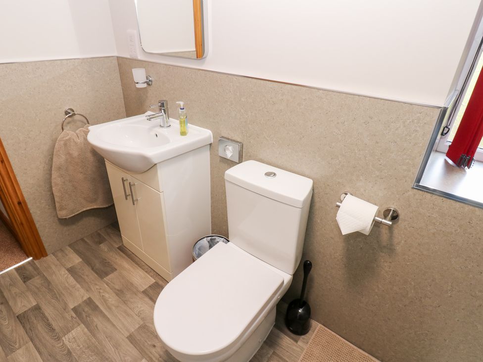 A bathroom with a sink and toilet at Stoneleigh Cottage in Muker