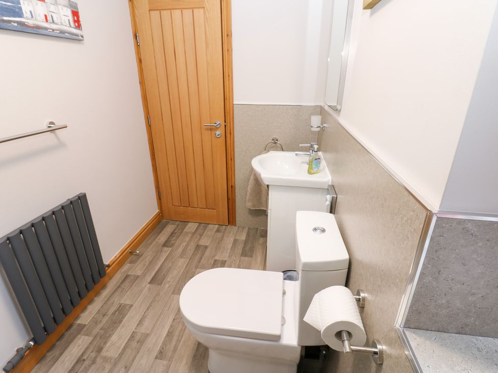A bathroom with a sink and toilet at Stoneleigh Cottage in Muker
