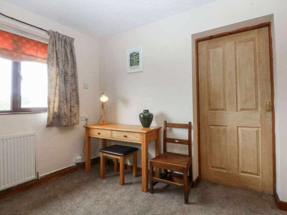An office with a desk and chair at Tir Mawr in Llanfairpwllgwyngyll