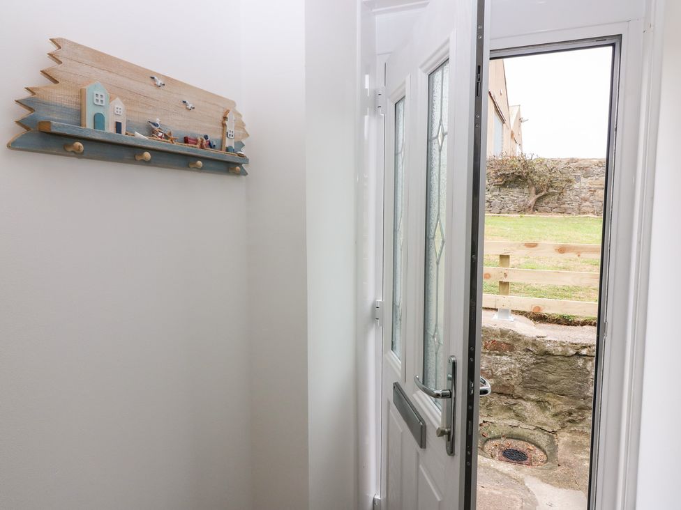 An entrance with a door and a coat rack at No.9 North St, Fraserburgh