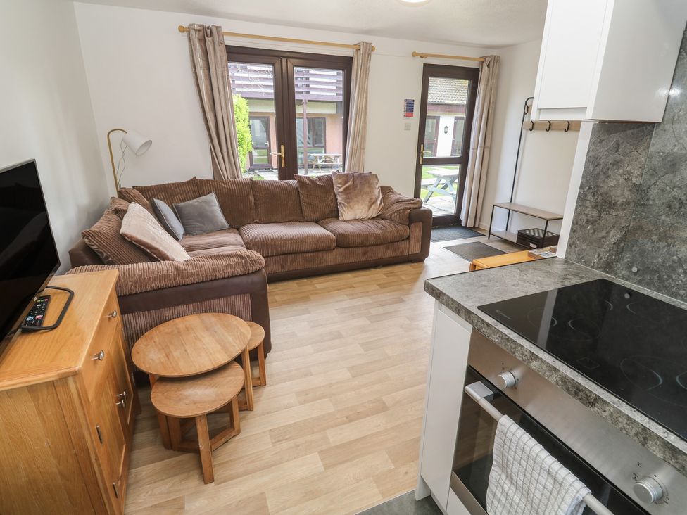 A living room with a sofa and coffee table at Tolroy Manor Holiday Park St Erth Praze near Hayle