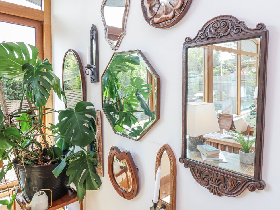 A room with mirrors and plants at Burlodge in Swimbridge near Barnstaple