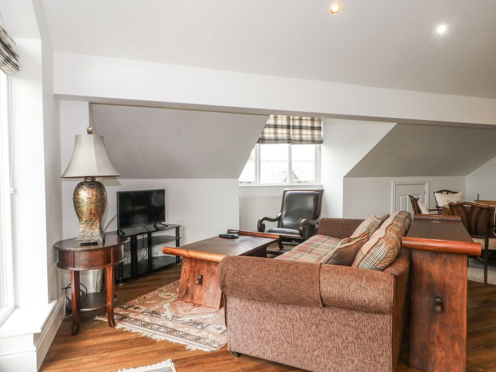 A living room with a sofa and coffee table at Poplar Farm Studio in Hatton Heath near Aldford