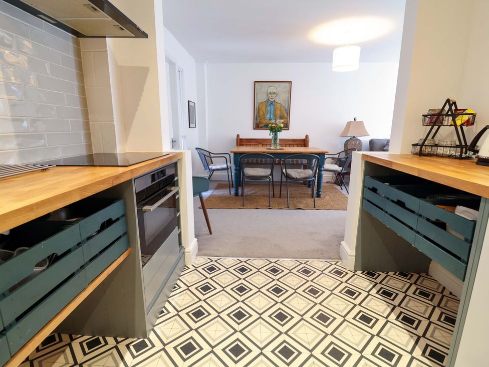 A kitchen with a dining area at Poplar Farm Studio in Hatton Heath near Aldford