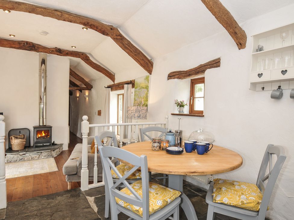 A dining room with a table and chairs at Skiber Long Bray Shop near Launceston