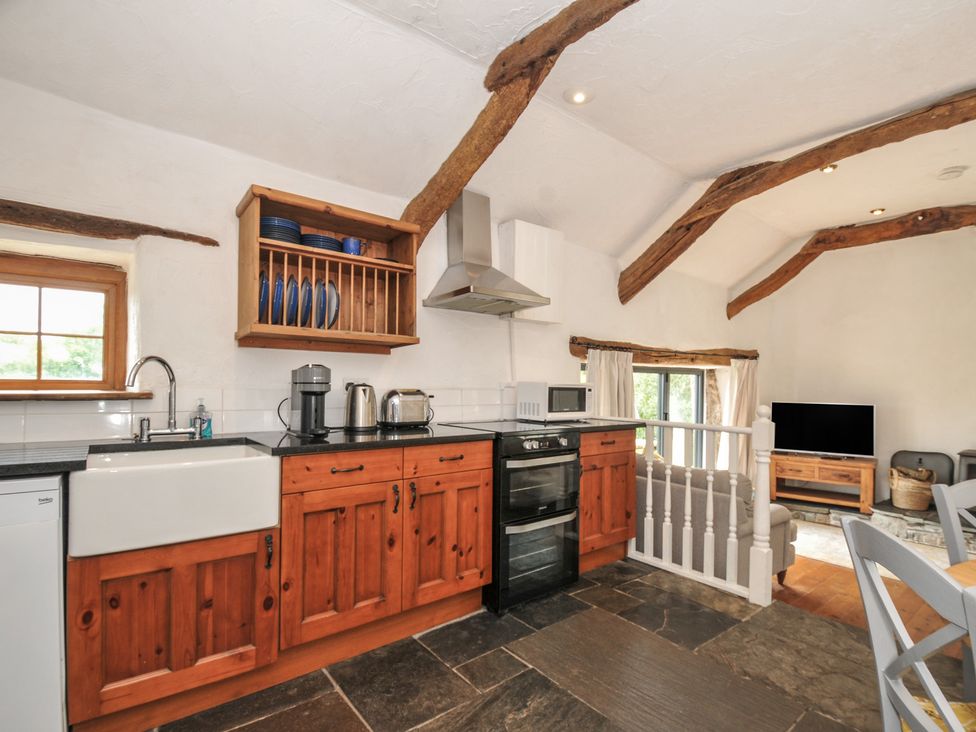 A kitchen with sink and cabinets at Skiber Long Bray Shop near Launceston