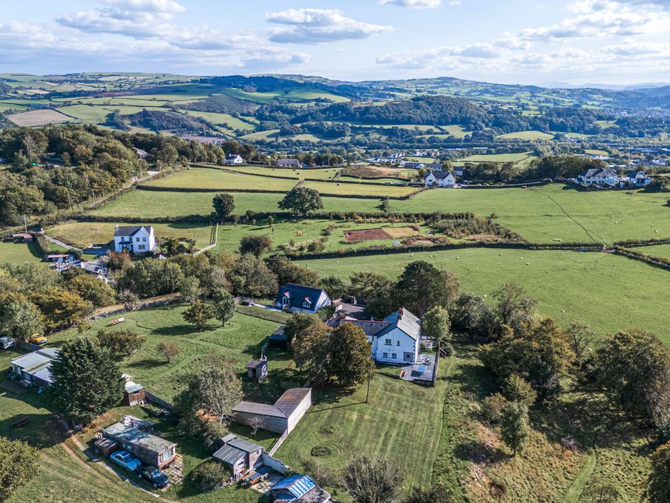 An aerial view of houses and fields at The Manor House Skerry Vore in Bryn Pydew near Llandudno Junction