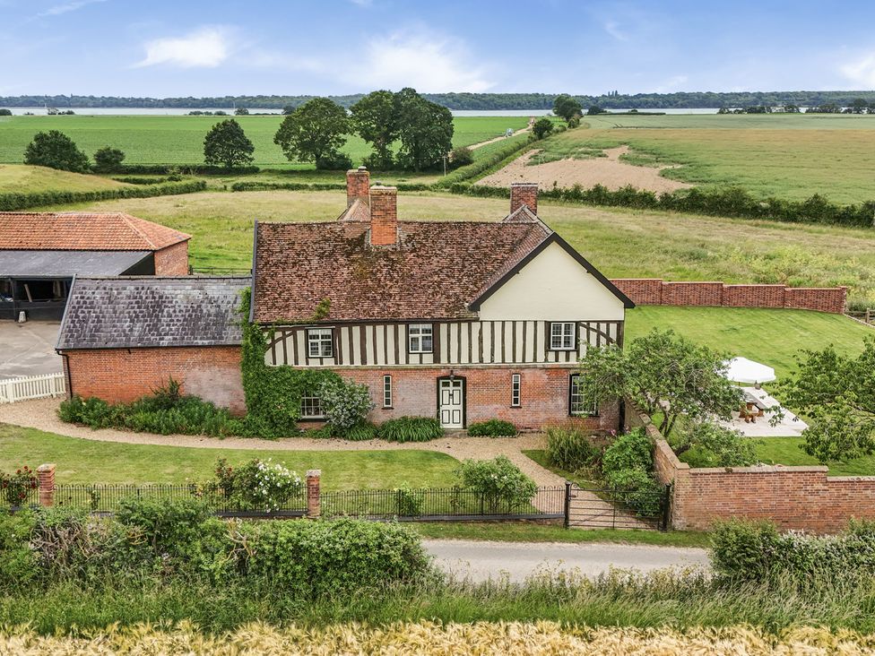 A house with garden and fields at Knights Farm in Harkstead