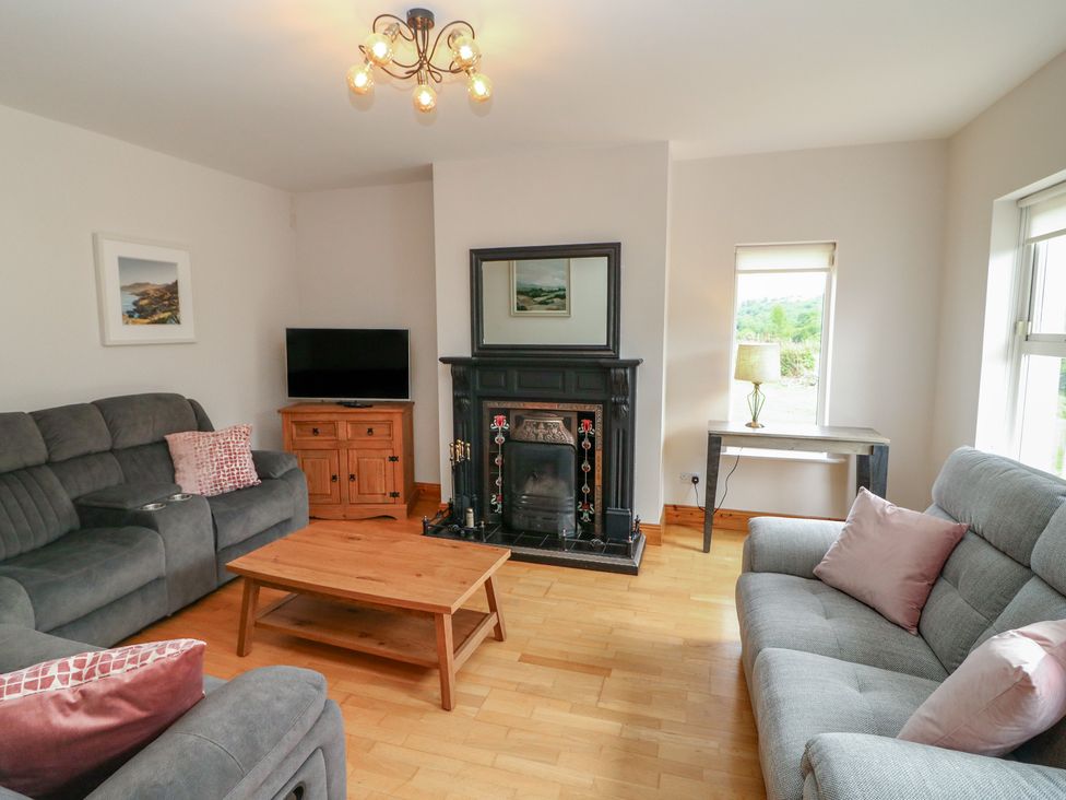 A living room with a sofa and coffee table at The Skating Rock near Kenmare, County Kerry