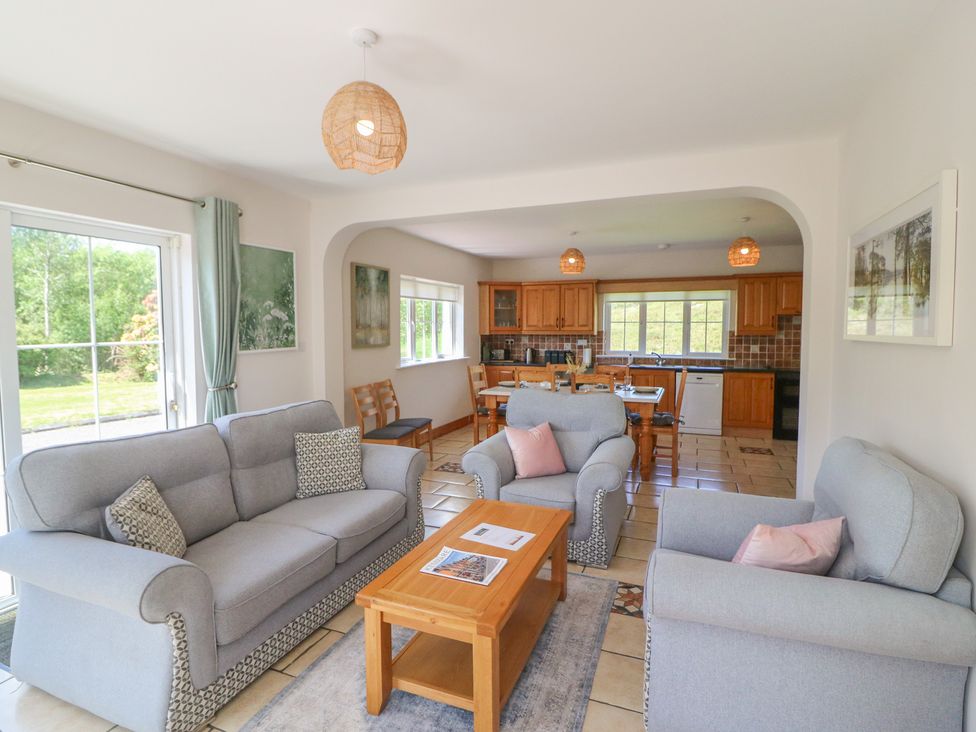 A living room with sofas and a coffee table at The Skating Rock in Bunane near Kenmare, County Kerry
