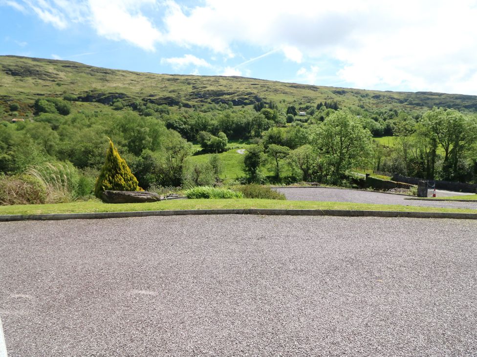 A view of a landscape with hills and greenery at The Skating Rock in Bunane near Kenmare, County Kerry