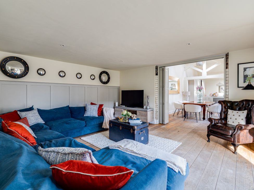 A living room with a sofa and television at The Old Chase in Chester
