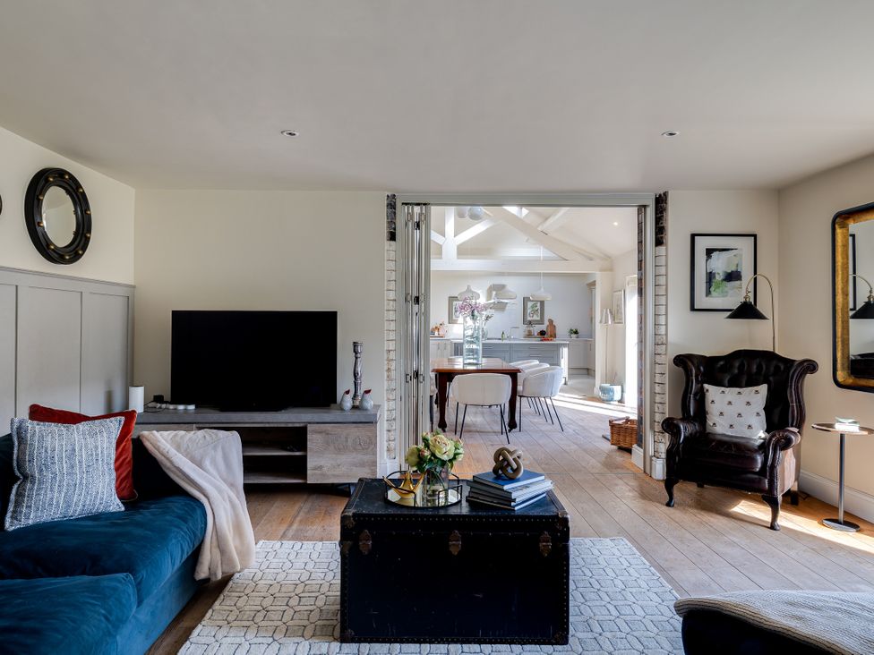 A living room with sofa and television at The Old Chase in Chester