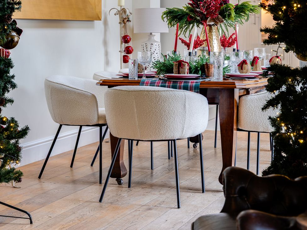 A dining room with a table set for a meal at The Old Chase in Chester