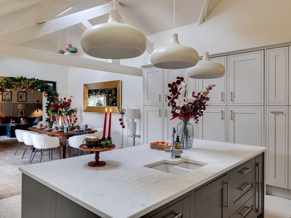 A kitchen with a sink and storage cabinets at The Old Chase in Chester