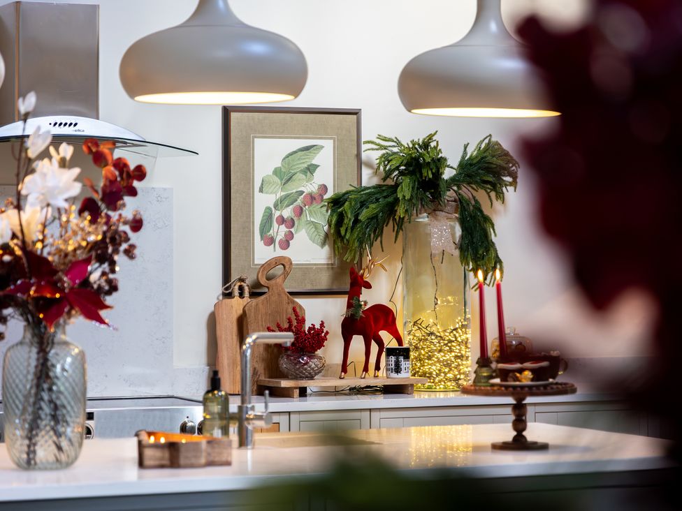 A kitchen with decor features including a deer figurine and decorative vase at The Old Chase in Chester