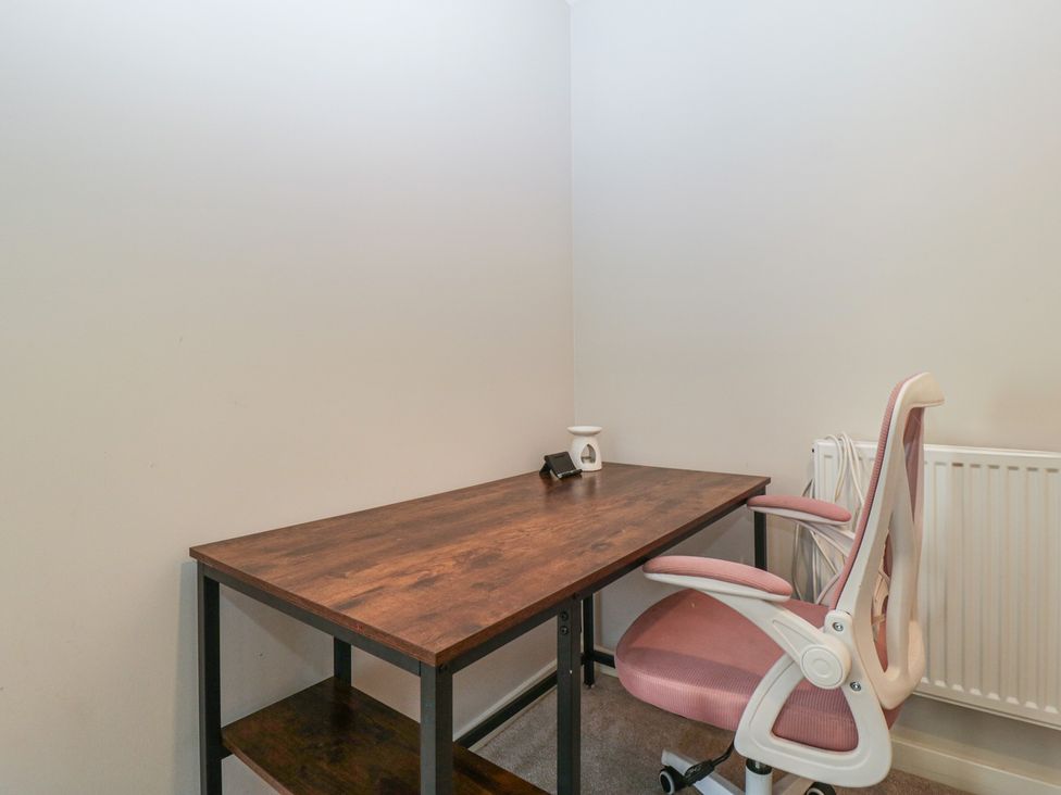 An office with a desk and a chair at 15 Hey Close Malvern