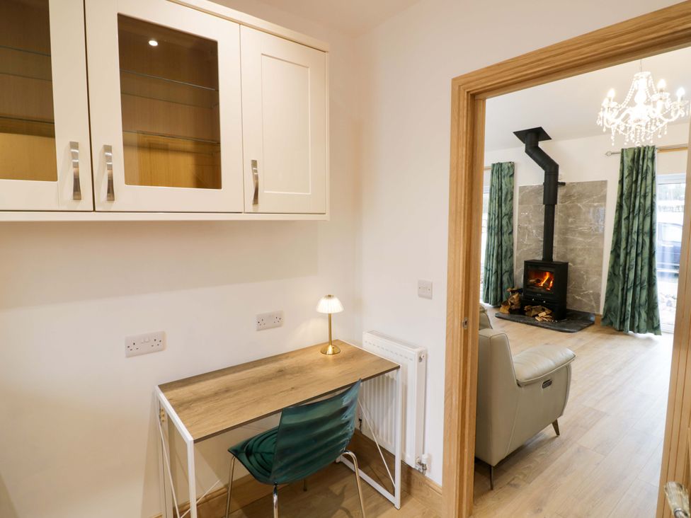 A study with a desk and a chair at The Barn in Astwood Bank