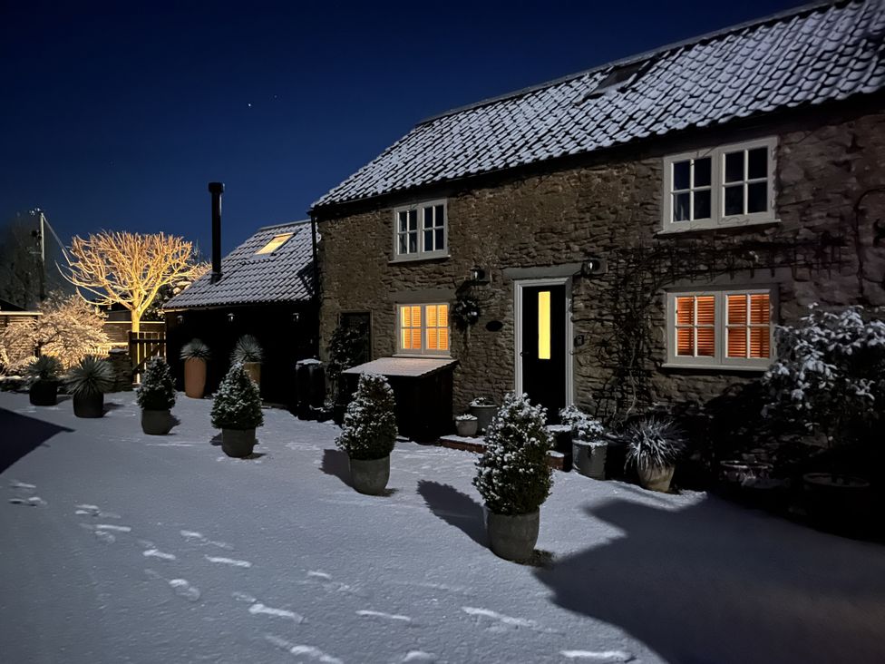 A house with snow in front at A Stones Throw in Sawdon near East Ayton