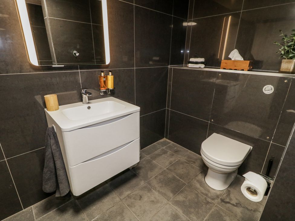 A bathroom with a sink and toilet at Derrywilligan 1,2,3 in Newry
