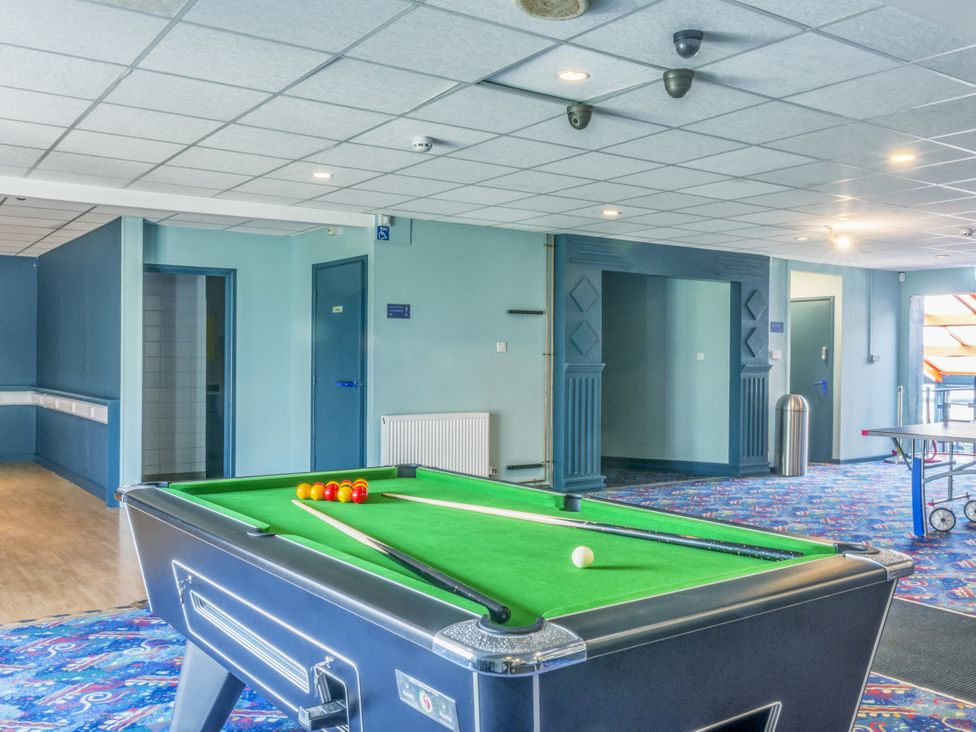 A game room with a pool table at Chalet 2 at Landscove Holiday Park in Brixham