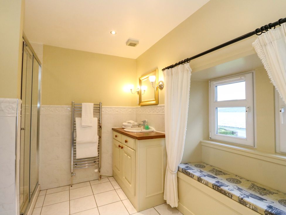 A bathroom with a sink and shower at Rudha Na Craig in Inveraray