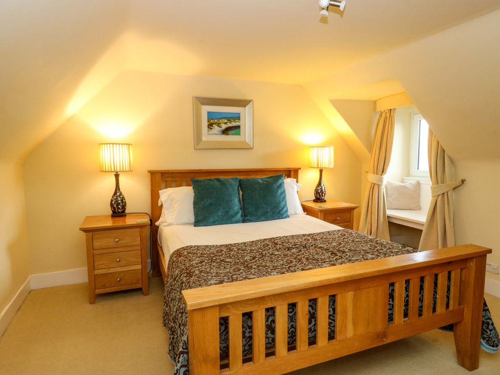 A bedroom with bed and nightstand at Rudha Na Craig in Inveraray