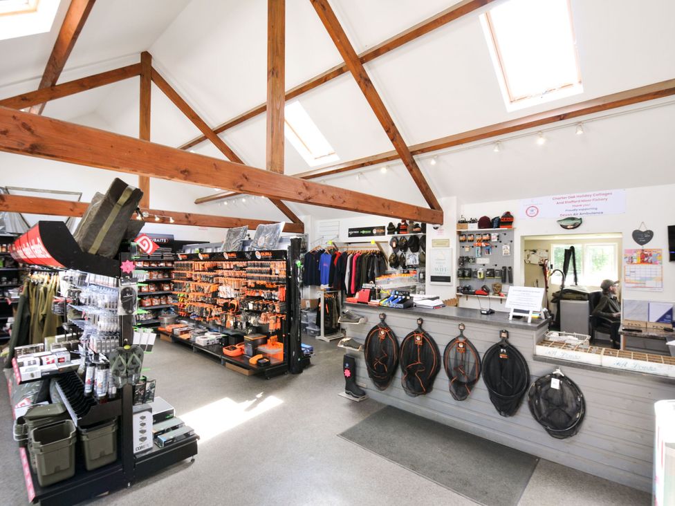 A store with fishing gear and clothing displays at Holly in Dolton
