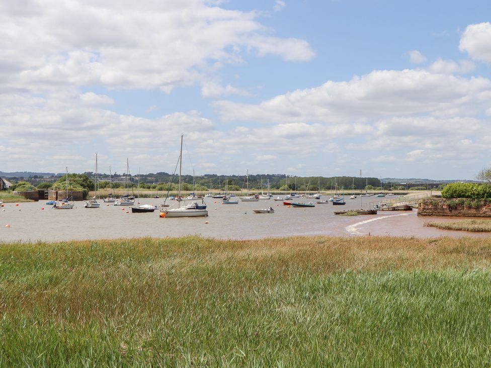 A view of boats on water surrounded by grass at 5 Exe Street Topsham