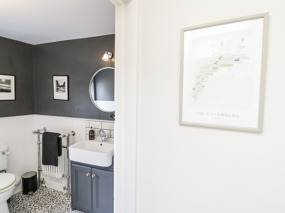A bathroom with a sink and toilet at Cotstone Cottage in Chipping Campden