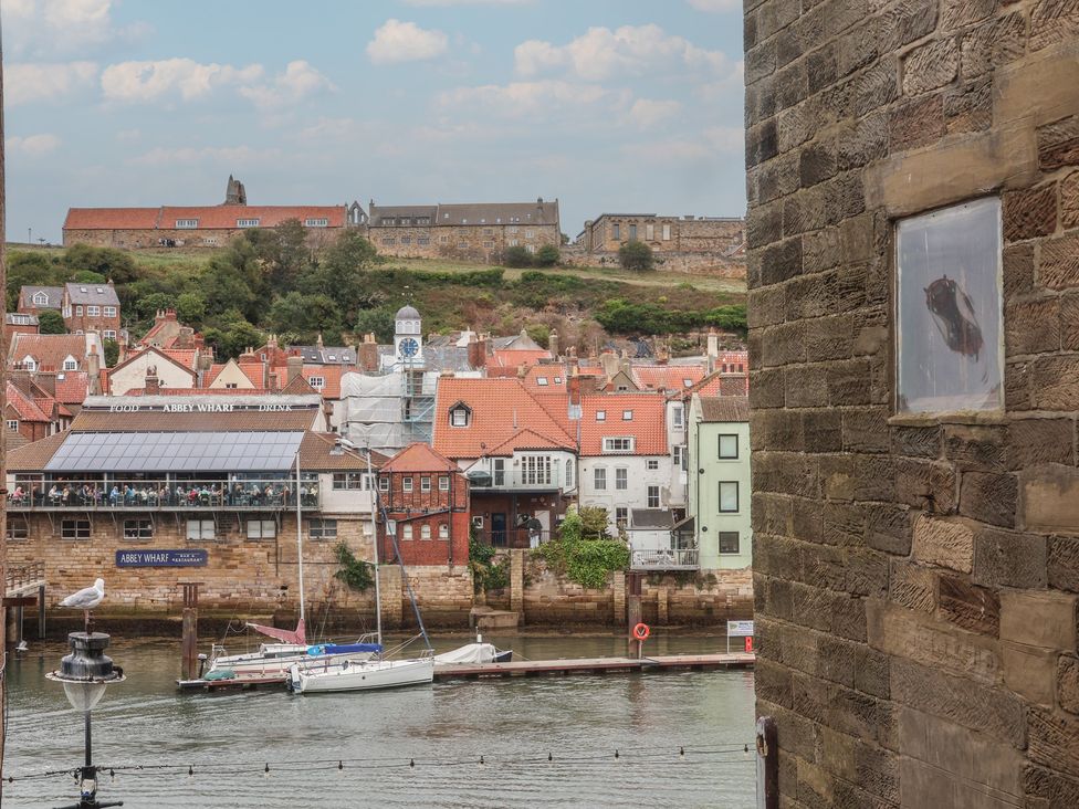 A view of buildings along the water at Jolly Roger in Whitby