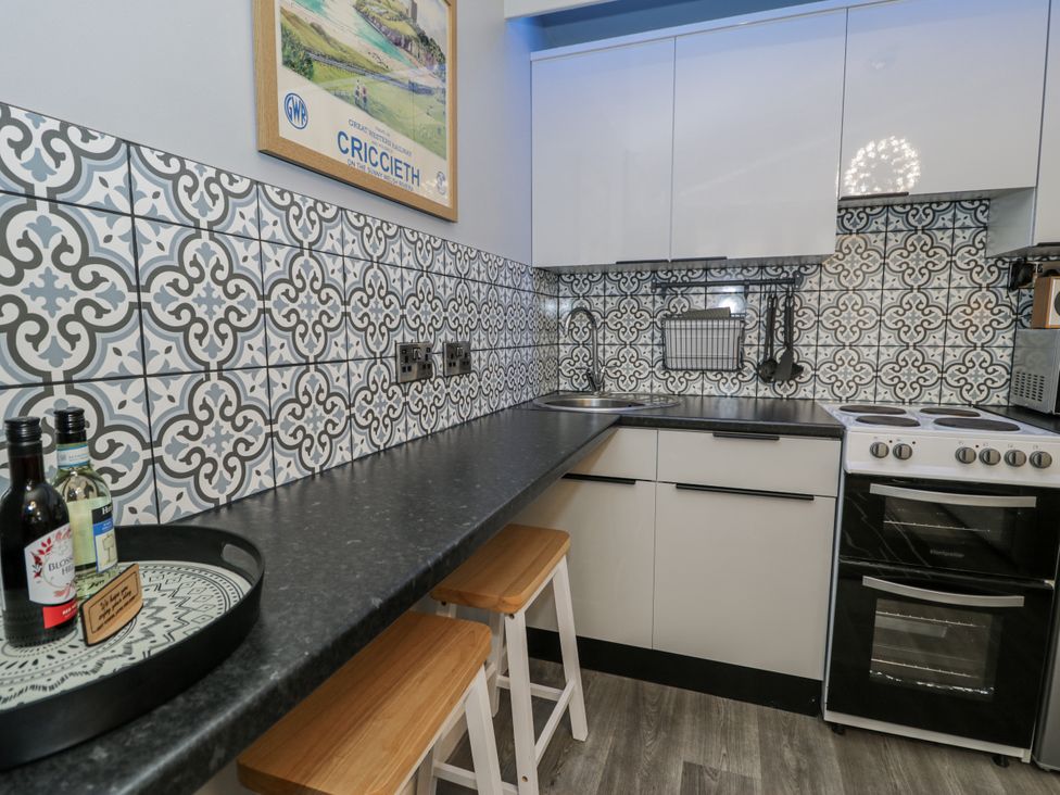 A kitchen with counter space and appliances at Estuary Escape in Porthmadog