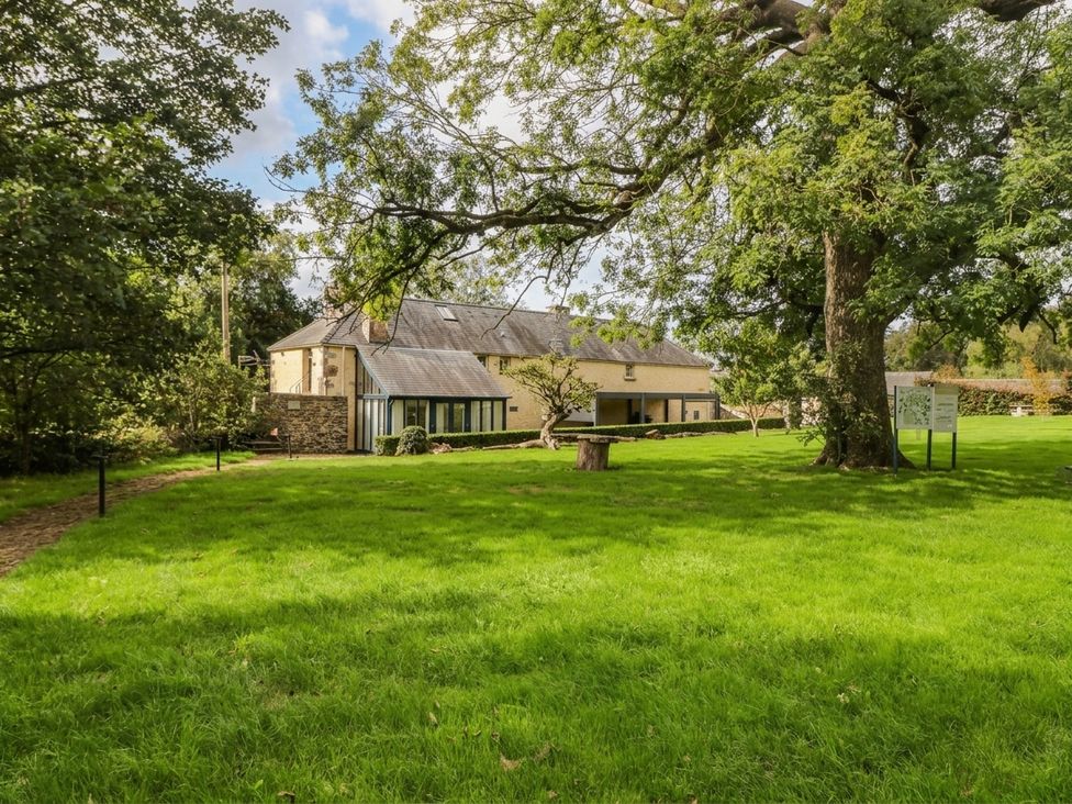A house with a garden and trees at The Carriages in St Athan