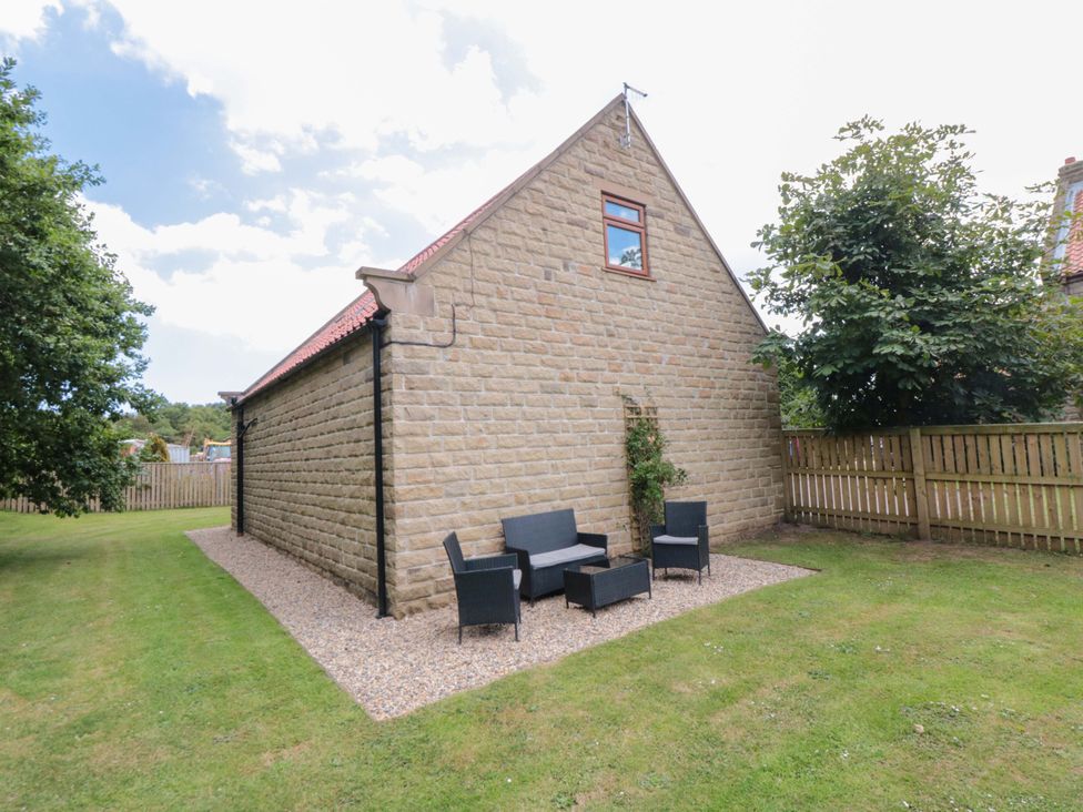 A garden with seating at Heron Nest in Cloughton near Scarborough