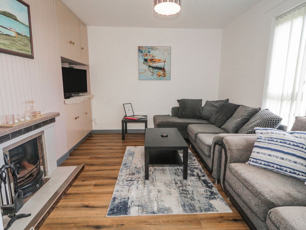 A living room with a sofa and coffee table at The Island's View in Gortahork, County Donegal