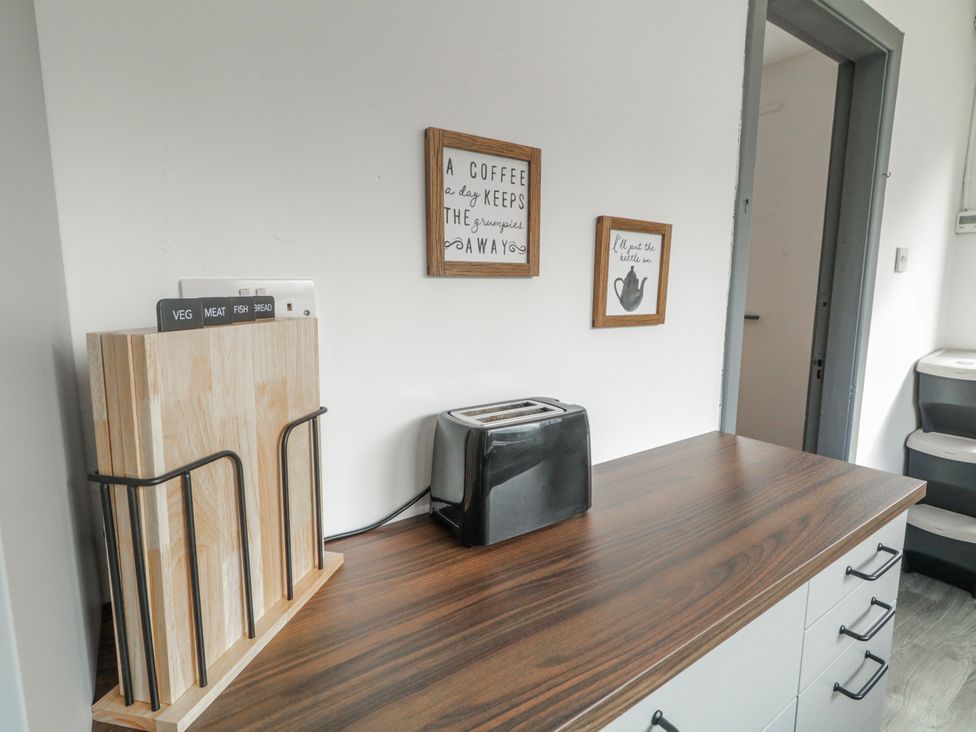 A kitchen with a toaster and chopping boards at The Island's View, Gortahork, County Donegal