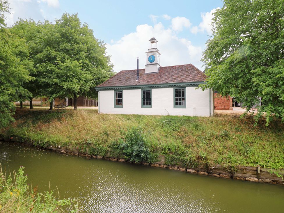 A building near a water body at Clock Tower in Stowmarket