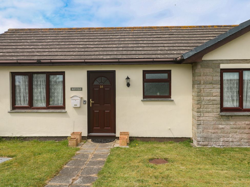 A house with a front door and pathway at 14 Bosvigo in Ruan Major near Penhale