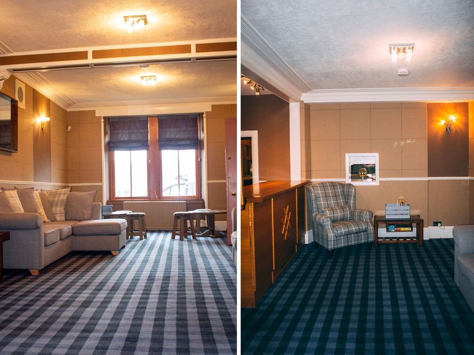 A living room with a sofa and coffee table at Crannoch Self Catering in Buckie
