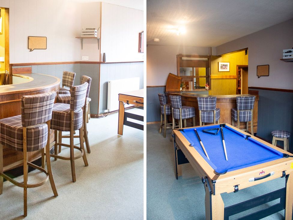A game room with a bar and pool table at Crannoch Self Catering Buckie