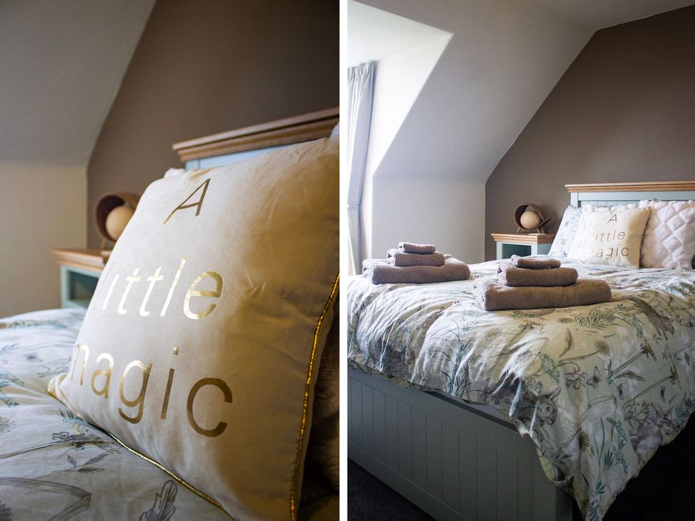 A bedroom with a bed and pillows at Crannoch Self Catering in Buckie