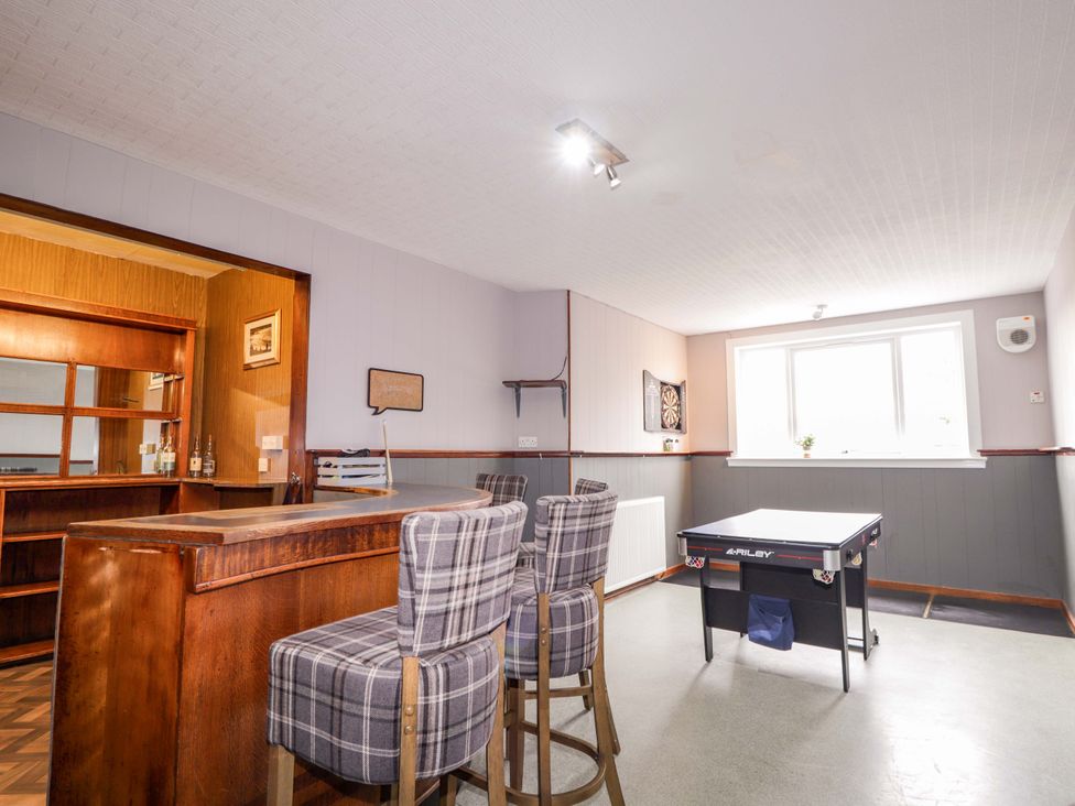 A games room with a bar and pool table at Crannoch Self Catering in Cullen