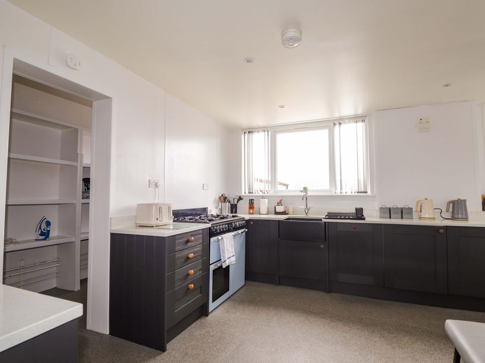 A kitchen with appliances and utensils at Crannoch Self Catering in Cullen