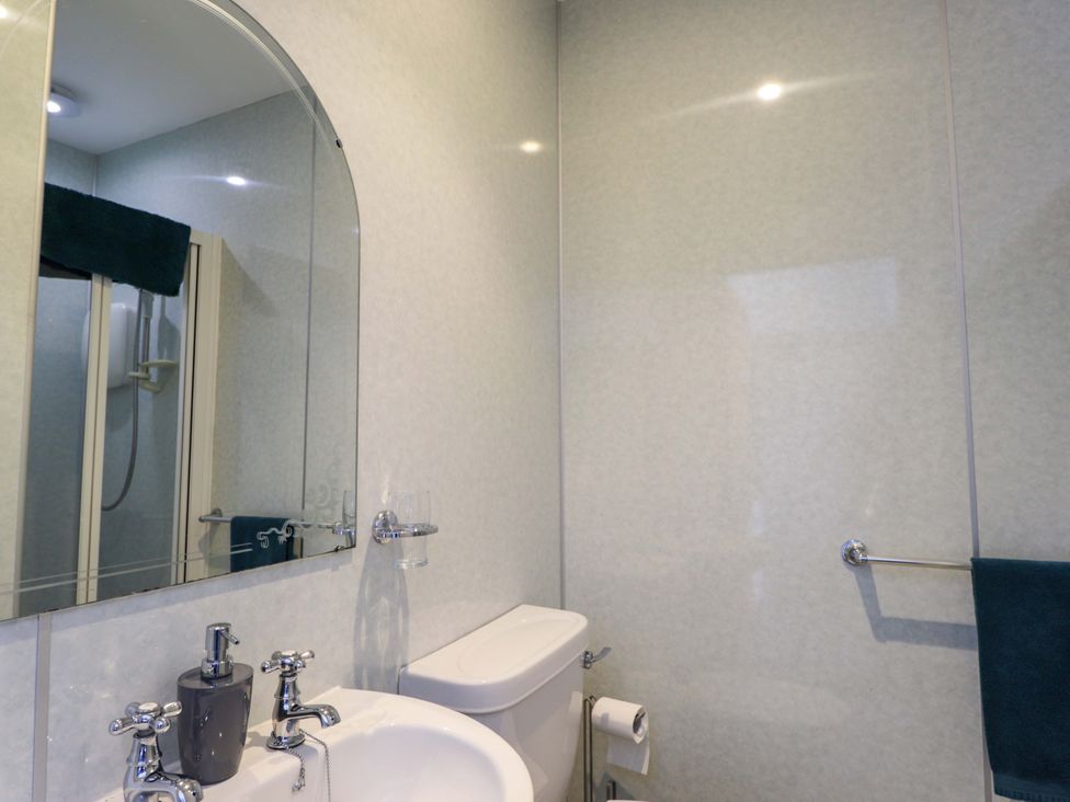 A bathroom with a sink and toilet at Crannoch Self Catering in Cullen