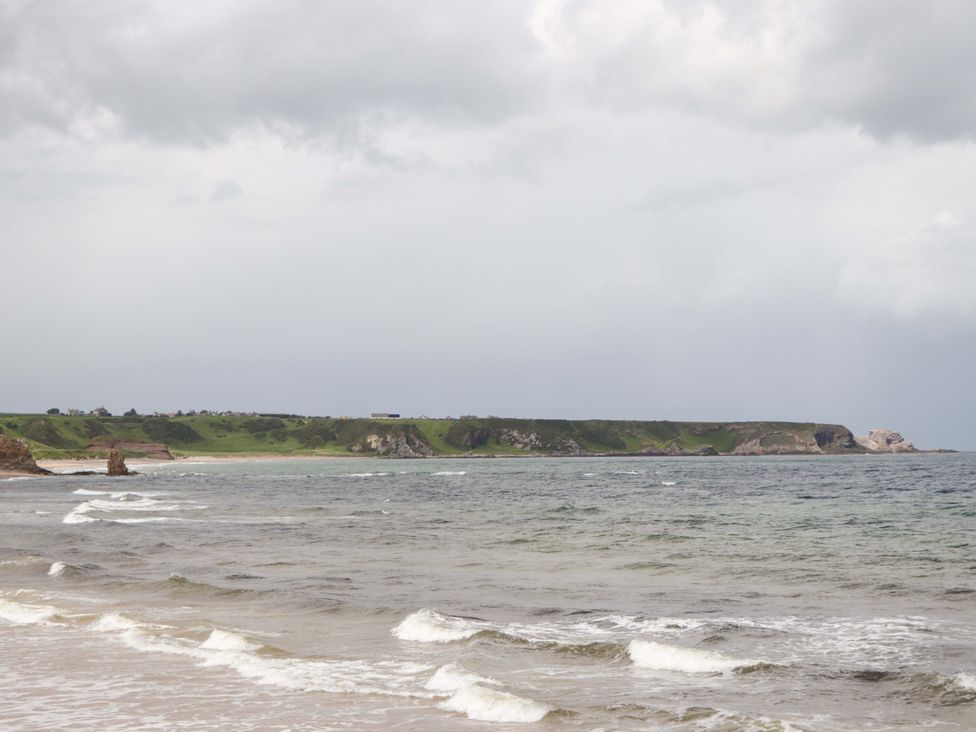 A view of ocean and cliffs at Crannoch Self Catering in Cullen