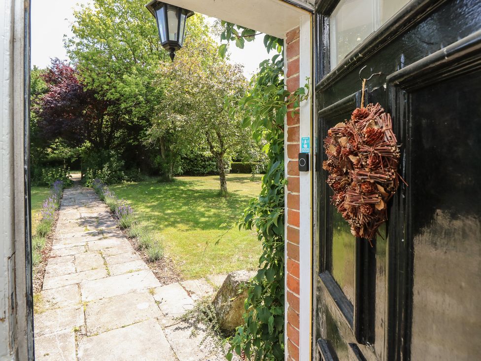 A view from the door into the garden at Guildford Farmhouse in Ryde