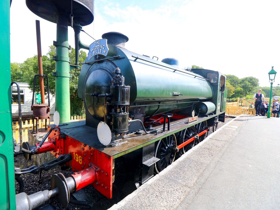 A steam engine at the platform at Guildford Farmhouse in Havenstreet near Newport, Isle Of Wight